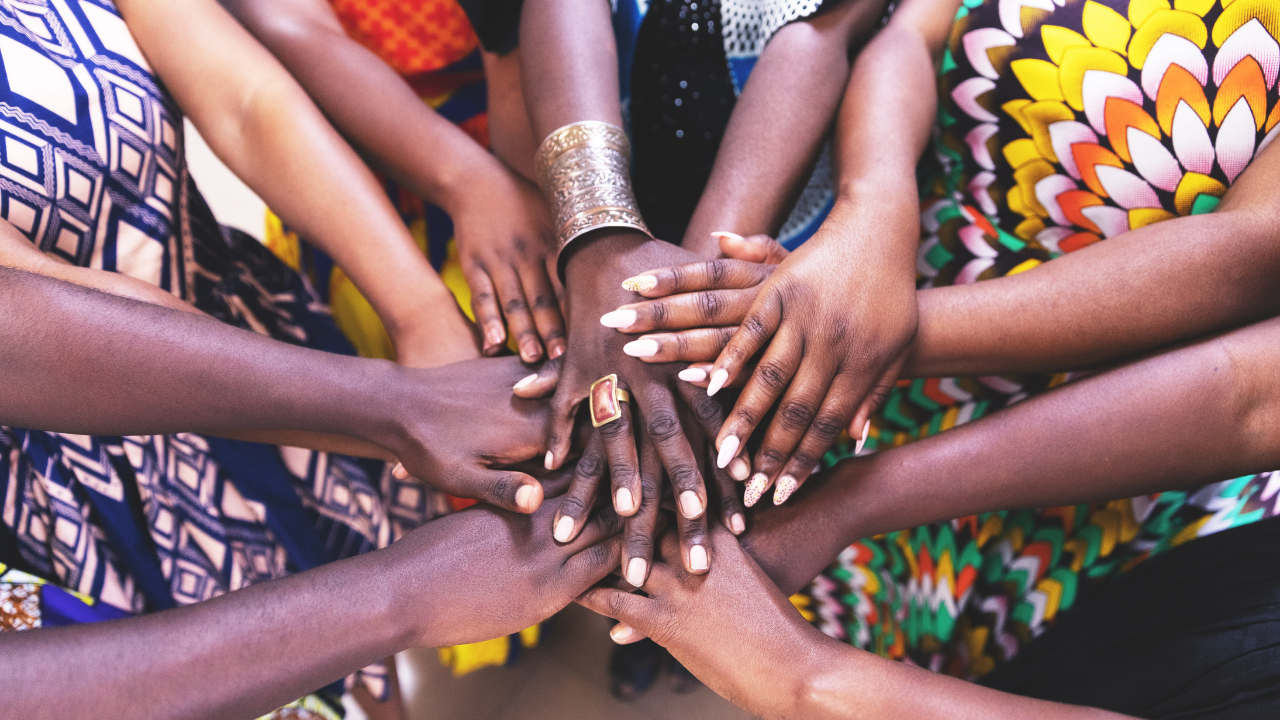 A woman in the field during a community outreach session